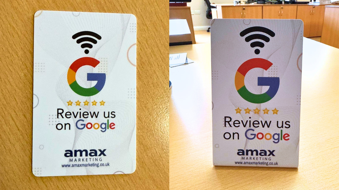 An NFC card lays on a table while or is shown as a stand to remind customers to leave reviews on google.